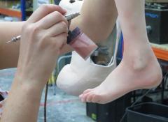 Spray work finishes to prosthetic feet, body double for Citroen commercial