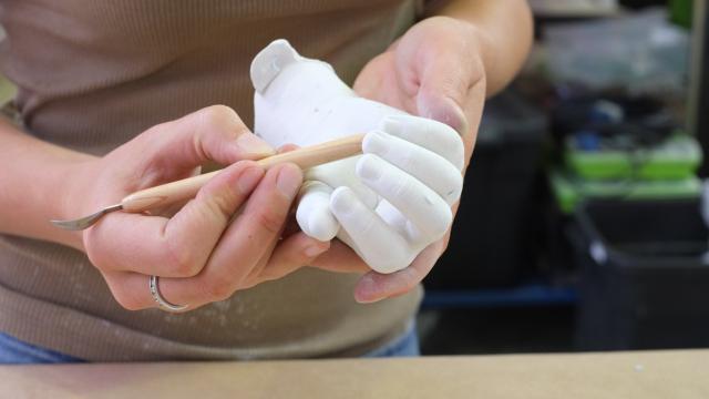 Plaster cast of a child's hand, Fabrication Environmental Policies in the workshop