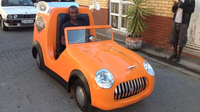 Julius Etah and the car he helped build Julius Etah and the car he helped build. Special Effects Cape Town